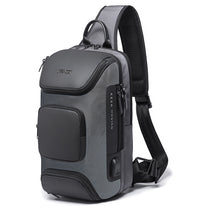 Load image into Gallery viewer, Cross Body Sling Style City Bag with USB Charging Port